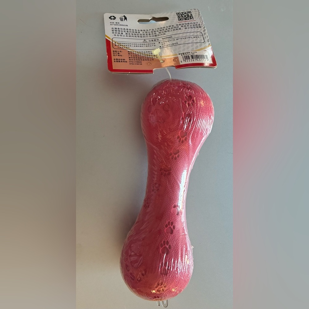 🦴 Red Dog Treat Toy with Paw Prints - Picture 2 of 5